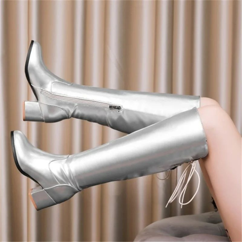 

Женские ботинки на высоком блочном каблуке, с бантом