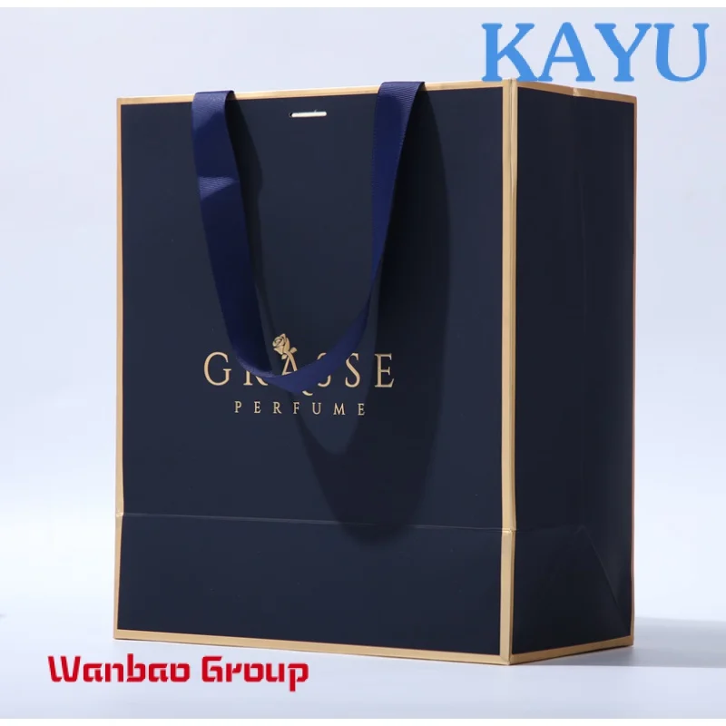 Wholesale paper bags custom logo clothes paper bag gold stamping luxury shopping clothes paper bags with logo ribbon handle