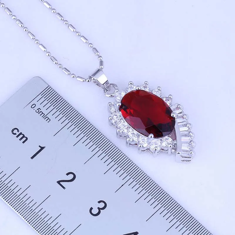 Женский ювелирный комплект из кольца и граната серебряного цвета | Украшения