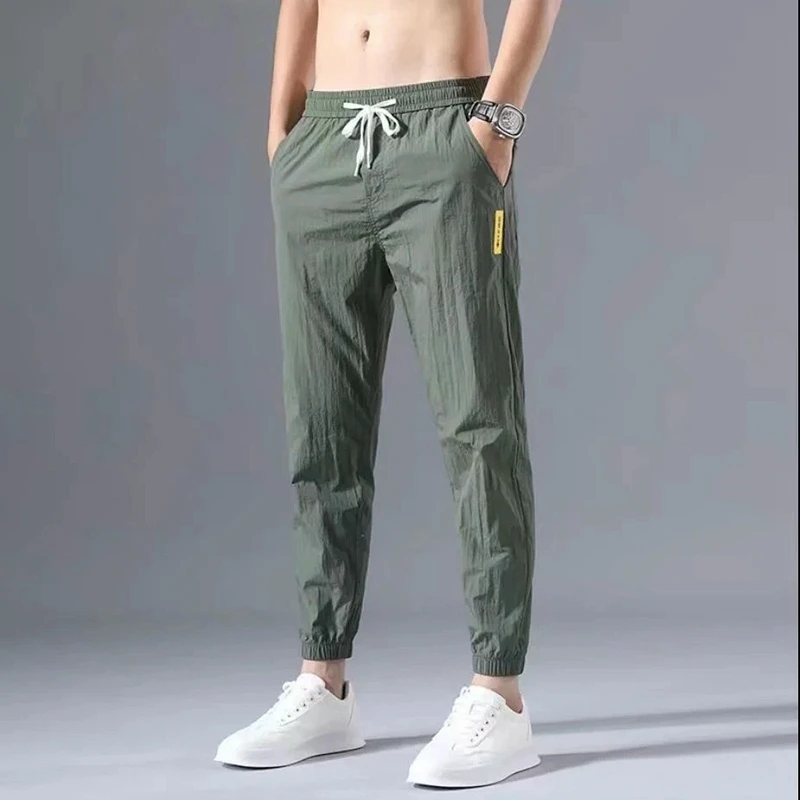 

New Mens Trousers Summer Ice Silk Thin Green Color Fashion Elastic Waist Nine Points Length Pants Men Casual Sports Joggers Pant