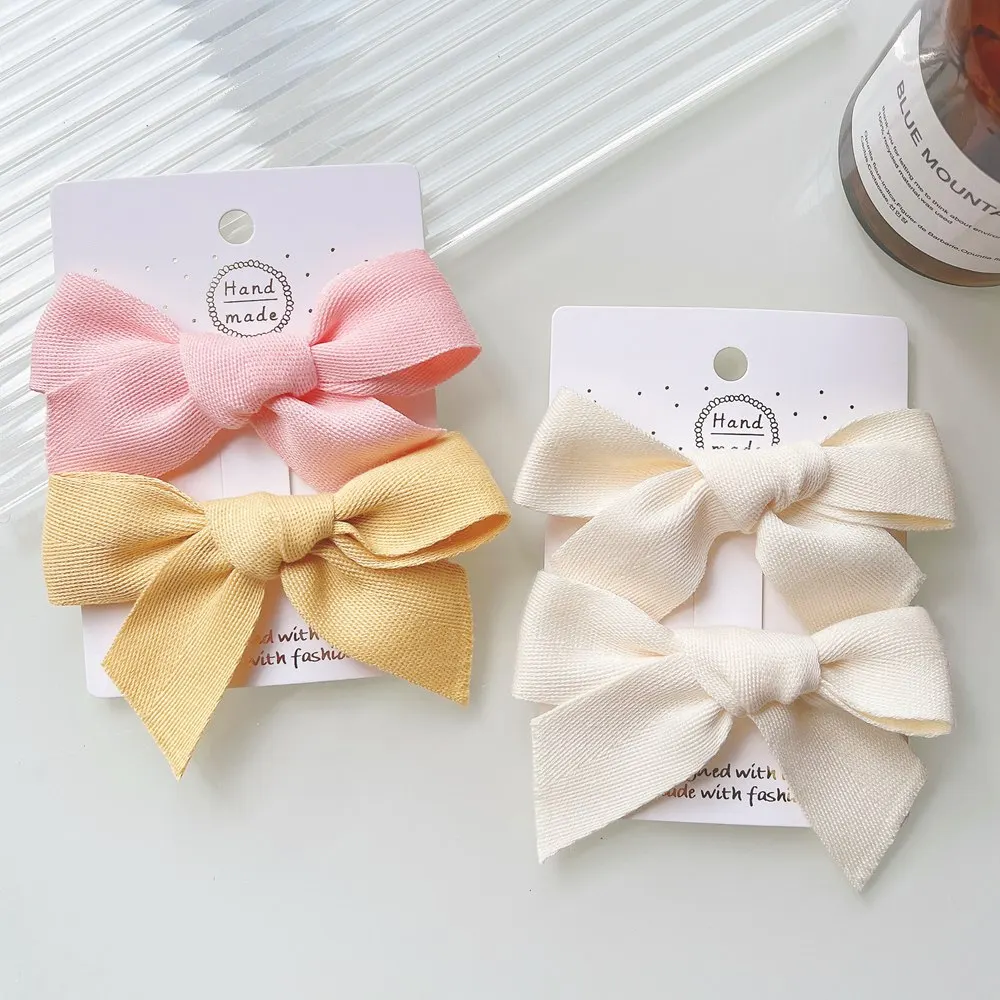 

2 шт./компл. милые однотонные заколки для волос с бантом для милых девочек, хлопковые заколки для волос, заколки для бутика, Детские аксессуар...