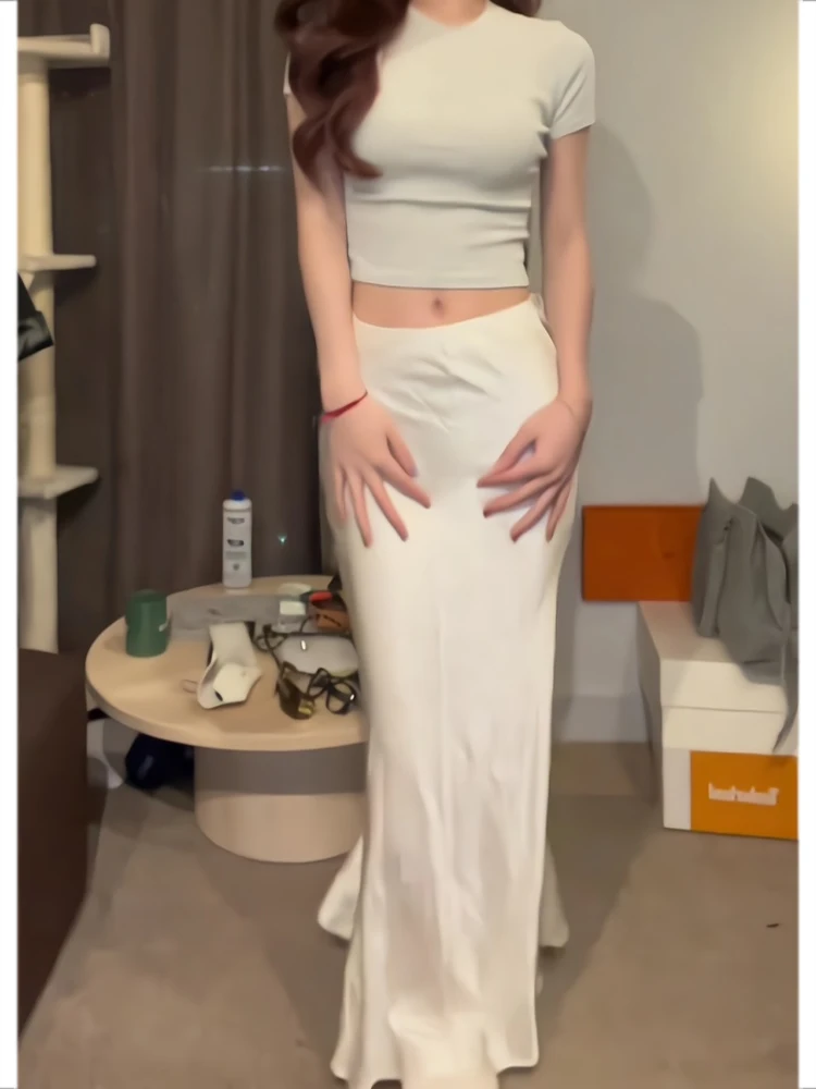 Популярная в этом году модная темпераментная утягивающая юбка с высокой талией