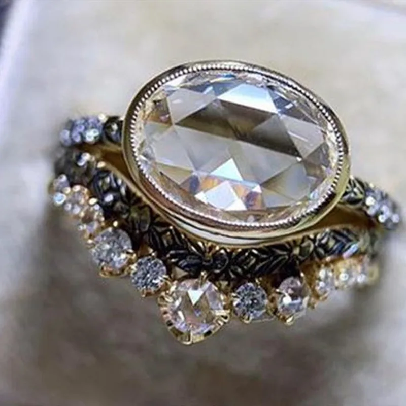 

Whole Sale Trendy Golden Color Crown Crystal Oval Zircon Luxury Metal Wedding Anniversary Ring Women