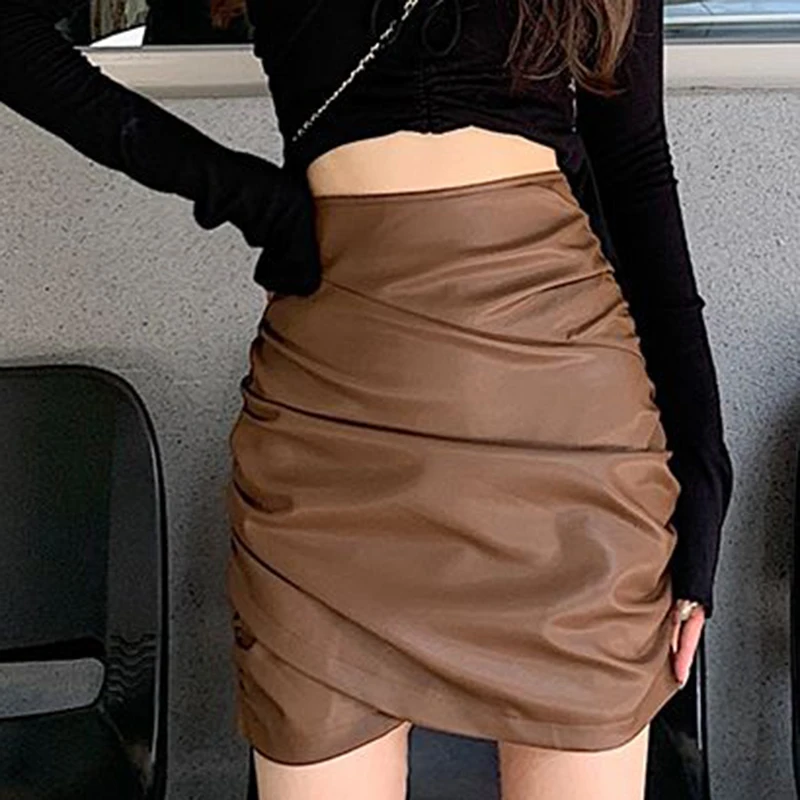 Casual irregular PU leather skirt 2022 autumn and winter new high waist pleated short skirt slimming hip skirt