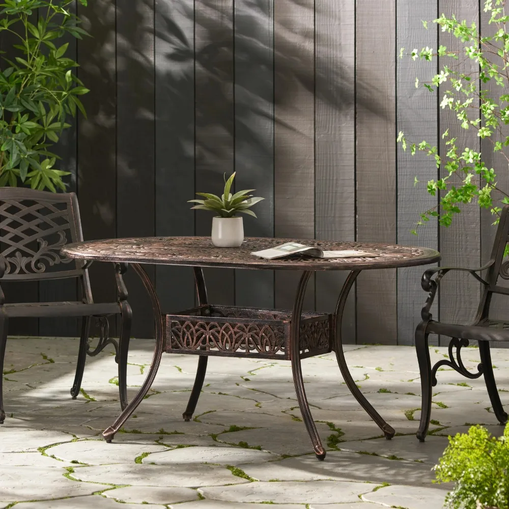 

Octavia Cast Aluminum Oval Dining Table, Shiny Copper