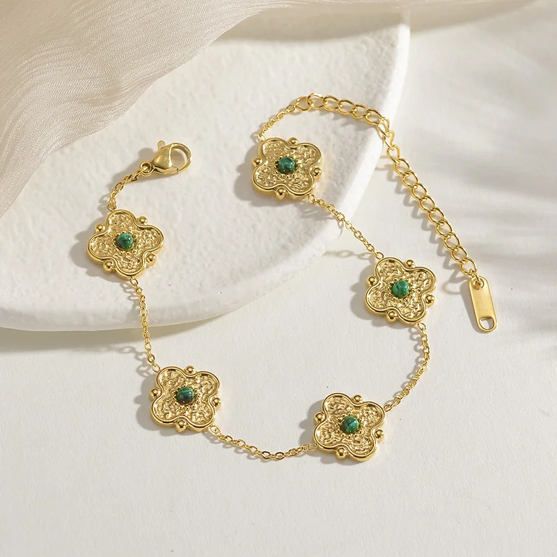 

Браслет с подвеской в виде цветка, из нержавеющей стали