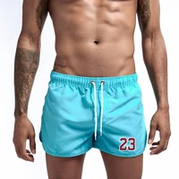 2022 summer mens swimming shorts summer board surfing sexy low waist trunks seaside surfing male shorts beach shorts for men