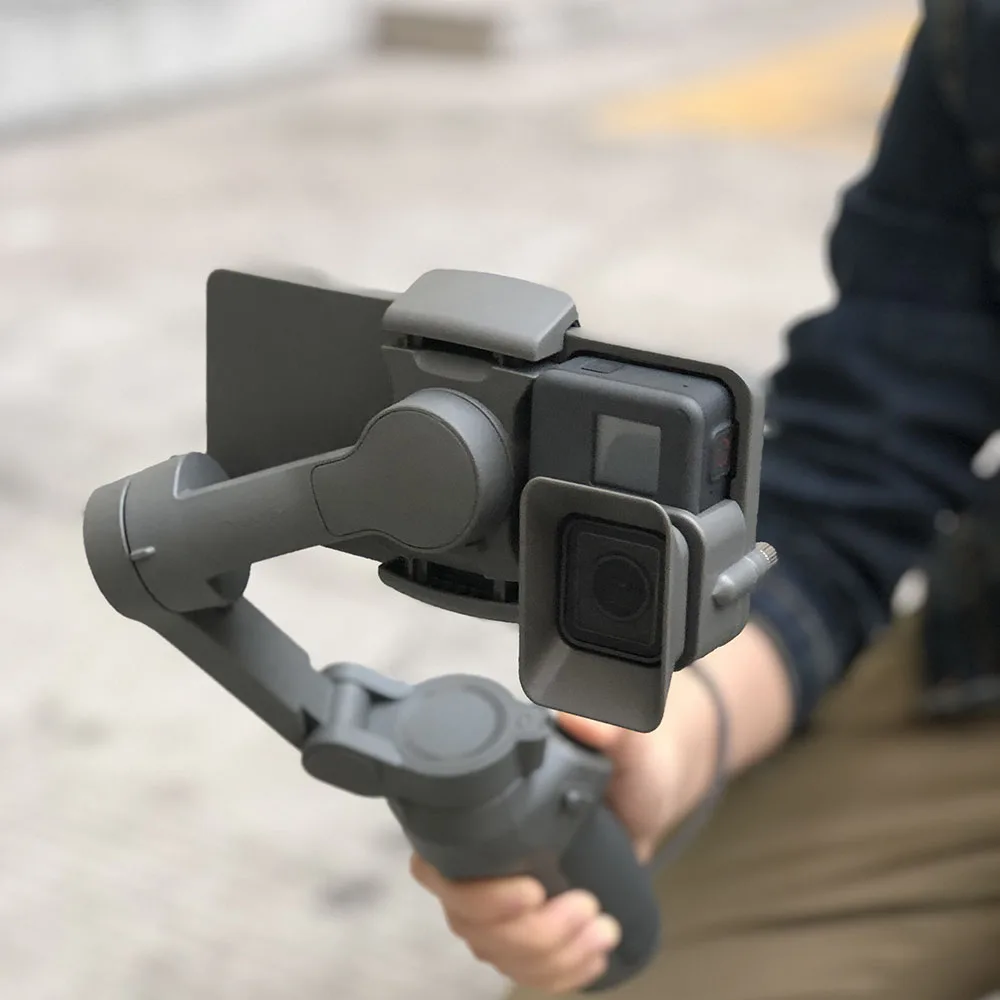 Основной перевод: Адаптер OM4 Osmo Mobile 3 Switch Mount для камеры Gopro 5 6 7 DJI Action Camera с крышкой объектива Ручная стабилизирующая подвеска на каркасе.