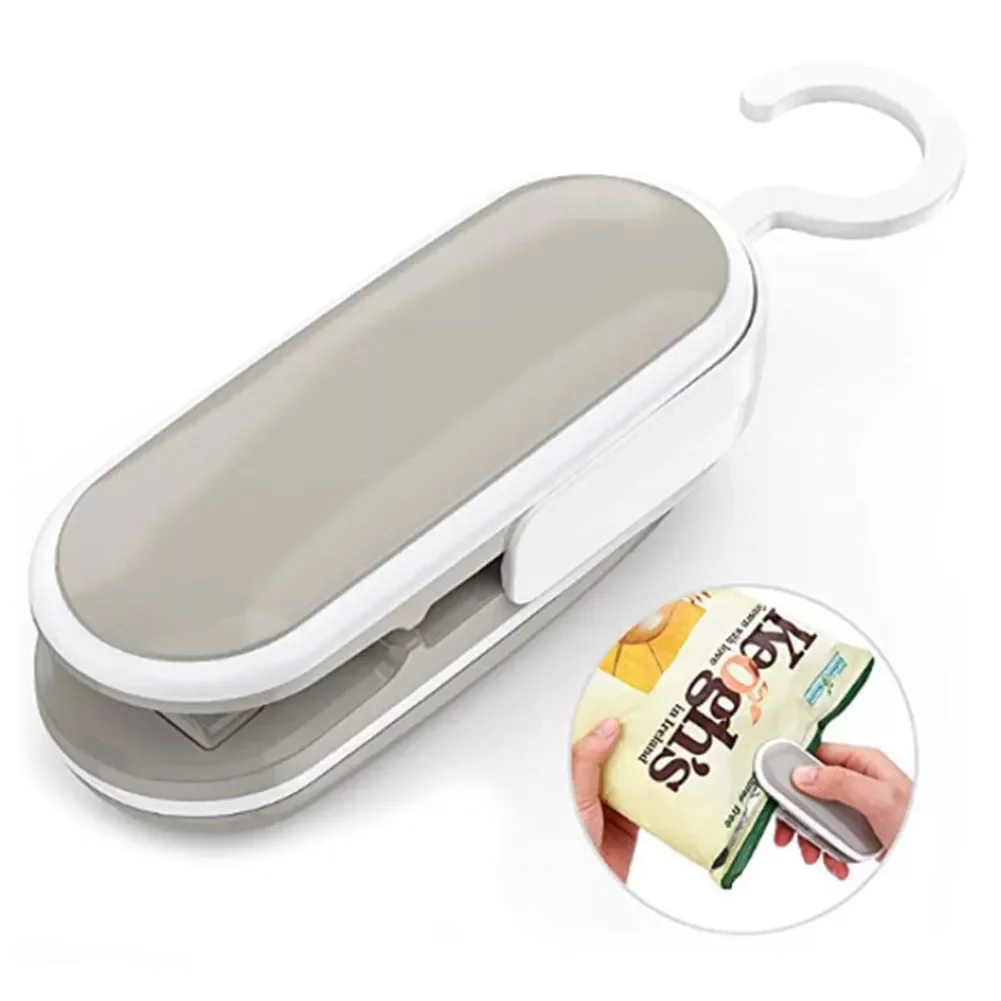 

NEW2022 Mini Bag Sealer Heat Seal Portable Paper Clips 2 in 1 Heat Sealer Cutter Household Handheld Sealing Machine Detachable