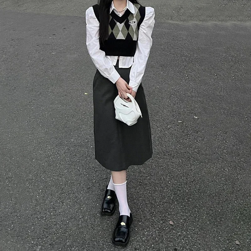 Вязаный топ в консервативном стиле жилет многослойный свитер ранняя осень зима