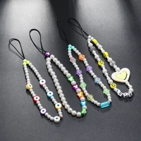 new version of cute pearl mobile phone shell lanyard soft ceramics smiley acrylic beaded wristband short mobile phone cha