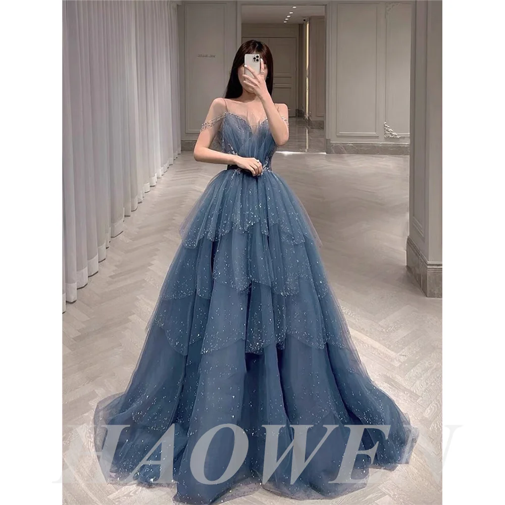 

HAOWEN Sparkly Dusty Blue Tulle Layered Skirt Prom Dresses Spaghetti Straps Sweetheart 3D Flowers Sequin Long Evening Gown