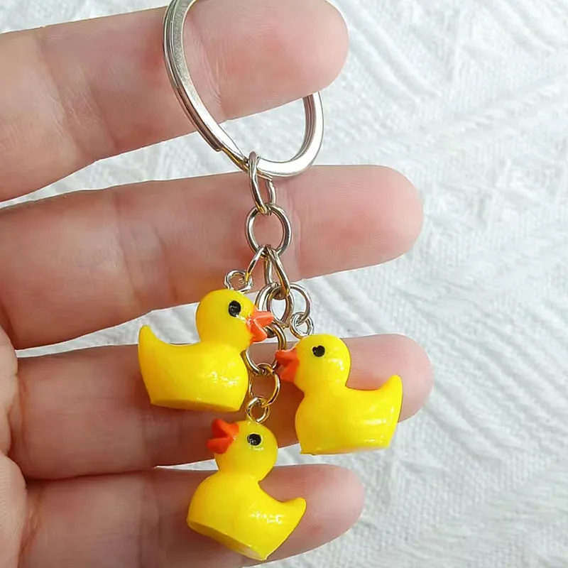 

Cute Little Yellow Acrylic plastic DUCK Key Chain Dancing Duck Keychain Couples Women Friend Gift Bag Pendant Accessory Keyring