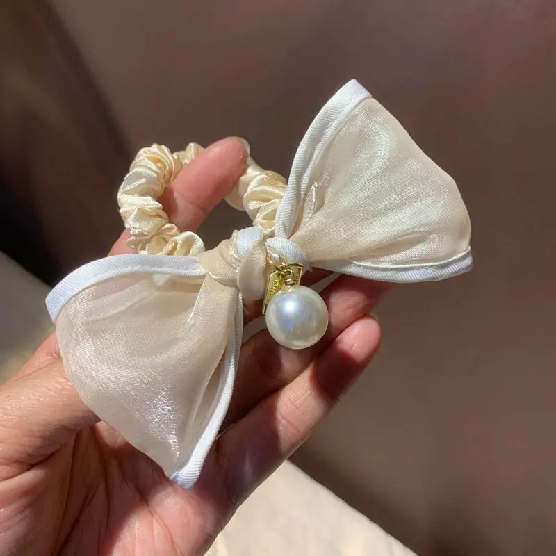 

Новинка, резинки для волос с бантом, романтическая французская Женская эластичная заколка для конского хвоста, резинка для волос с жемчужин...