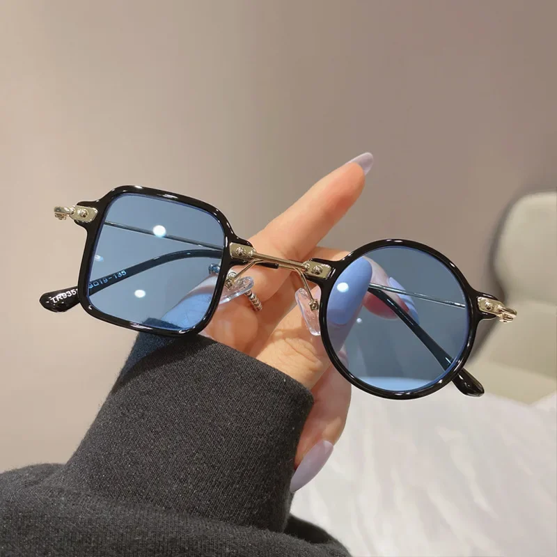 Солнцезащитные очки в круглой оправе UV400