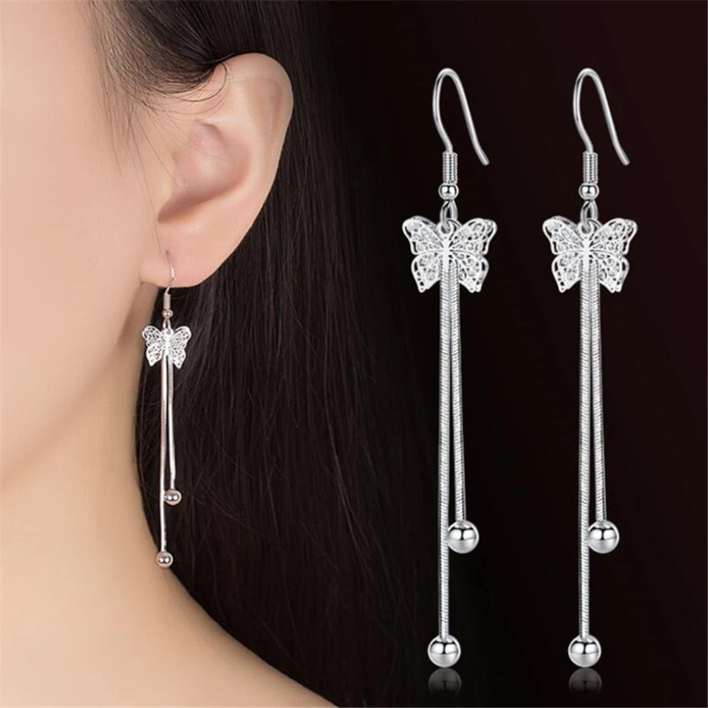 

NEHZY Silver plating exaggerated in the long paragraph tassel Drop Earrings fashion hollow bow flying earrings female silver jew