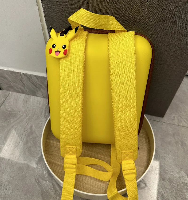 Фото Новый рюкзак Pokémon Kawaii Pikachu, школьная сумка с мультяшным дизайном, маленький размер, жесткий корпус, легкий, для путешествий, активного отдыха и повседневного использования. №4