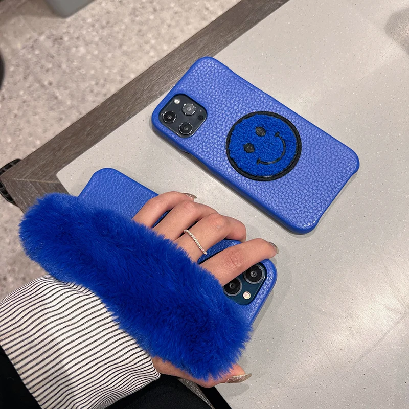 

Klein Blue Leather Shell Smiley 9 Plush Wristband Phone Case For iPhone 11 12 13 Pro Max Phone Case Plush Wristband Luxury Cover