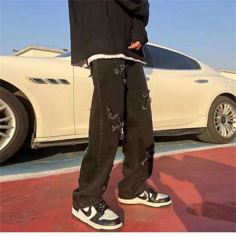 New Fashion Trend Casual Streetwear Printed Cross Trousers Jeans Pants Baggy Men Jeans Denim Pants Fashion Loose Wide Leg Jeans