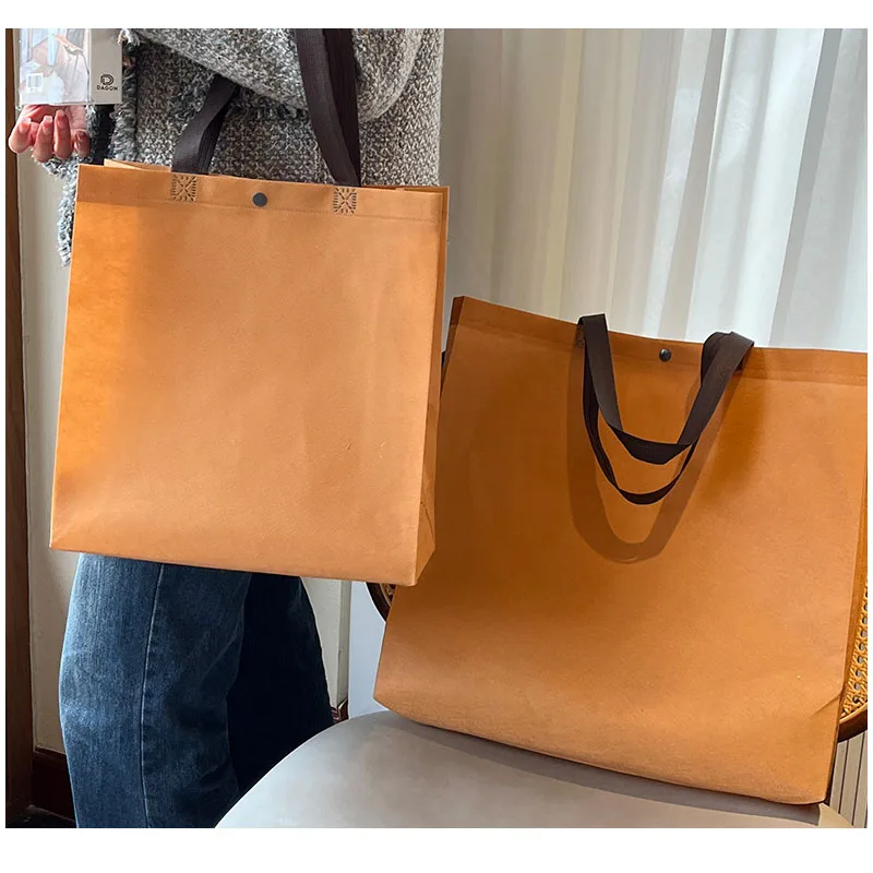 

Темная Пряжка Одежда нетканые тканевые сумки Защита окружающей среды нетканые рекламные сумки шоппинг