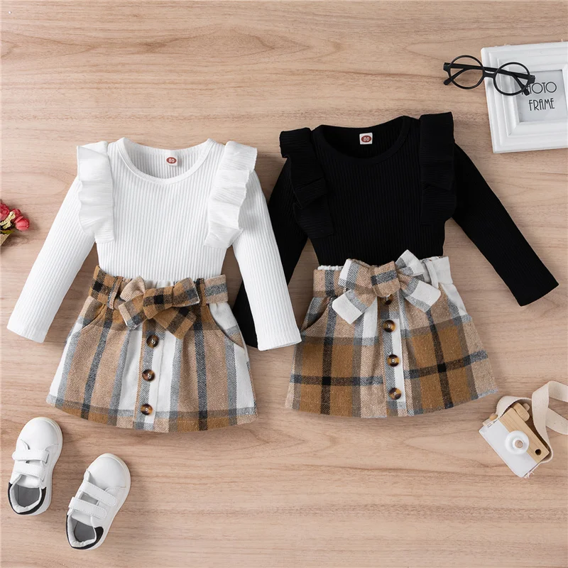 

Toddler Kids Girls 2Pcs Outfit, Long Sleeve Knitted Ribbed Solid Color Tops+Bowknot Buttons Plaid Mini Skirt Set, 9Months-4Years