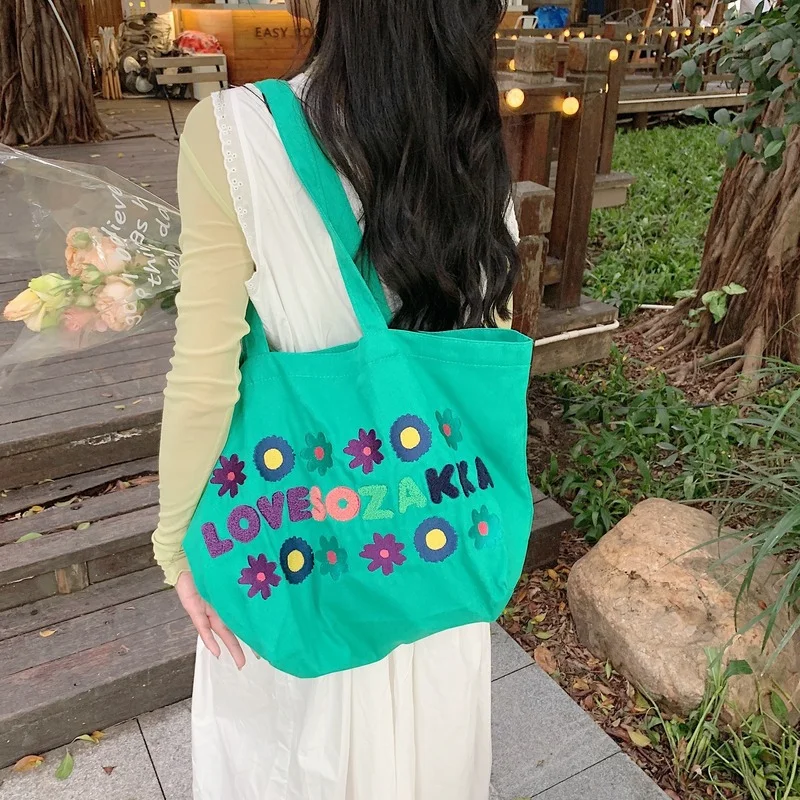 

New Women's Canvas Bag Trendy Embroidered Flower Shoulder Bags for Women 2022 Large-capacity Open Student Shopping Bag
