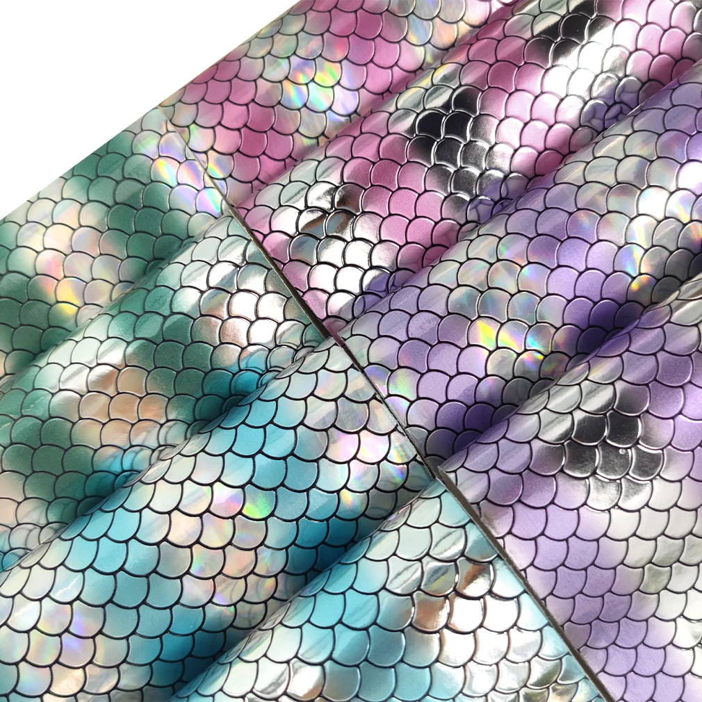 

Laser Gradient Holographic Iridescent Fish Scale Embossed PU Fabric Synthetic Faux Leather Rolls For Making Handicraft Materials