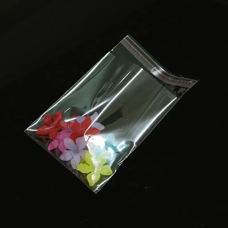 Фото 100Pcs OPP Self Adhesive Clear Plastic Bag Transparent Cellophane Bags Self Sealing for Jewelry Gift Cookie Candy Packaging №5