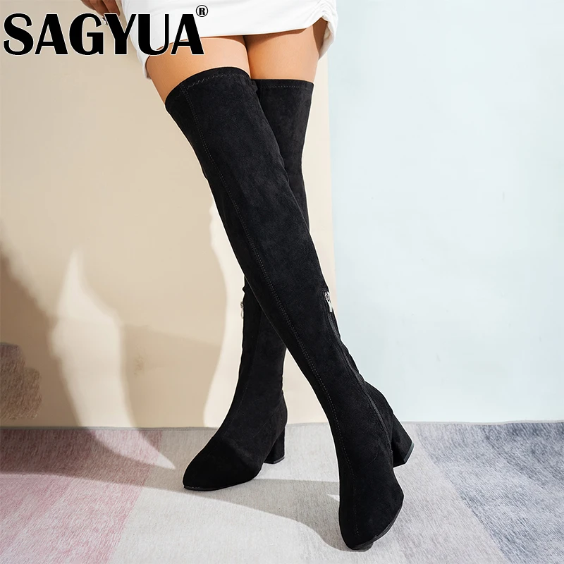 Женские сапоги выше колена на высоком каблуке. Замшевые туфли массивном