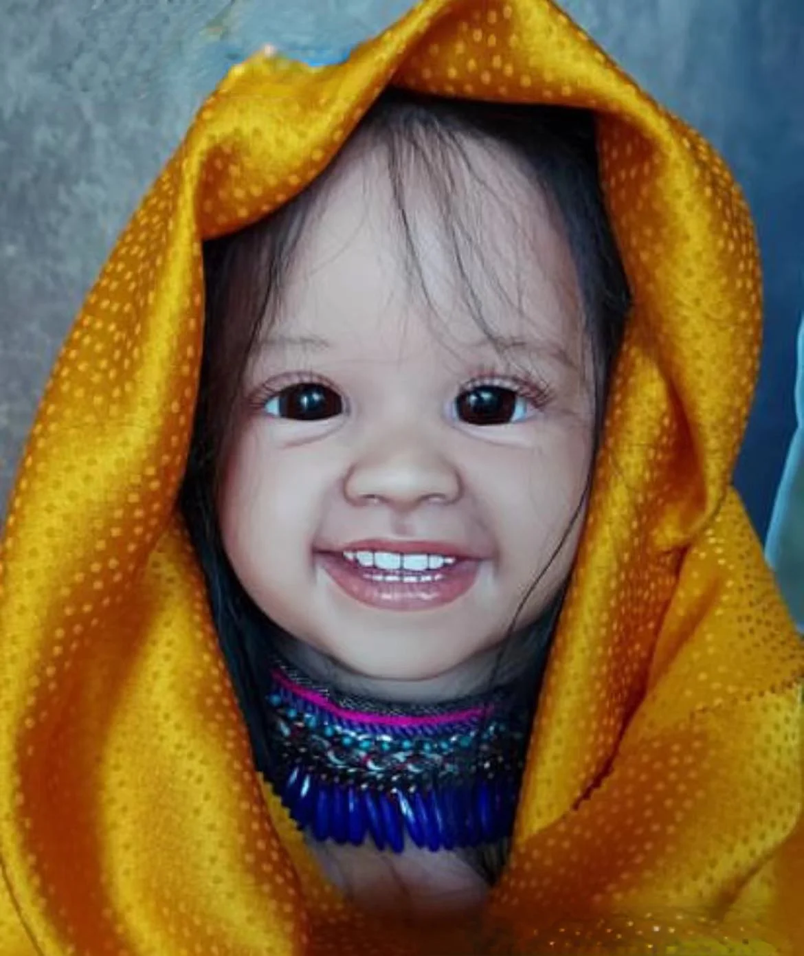 Рисунок 2 - Кукла реборн с длинными черными волосами