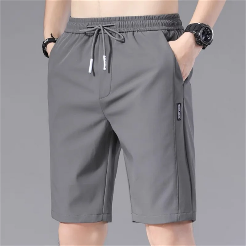 

2023 Summer Men'S Sports Shorts Solid Color Straight Pattern Loose Type Elastic Waist Drawstring Casual Shorts Jogging Pants