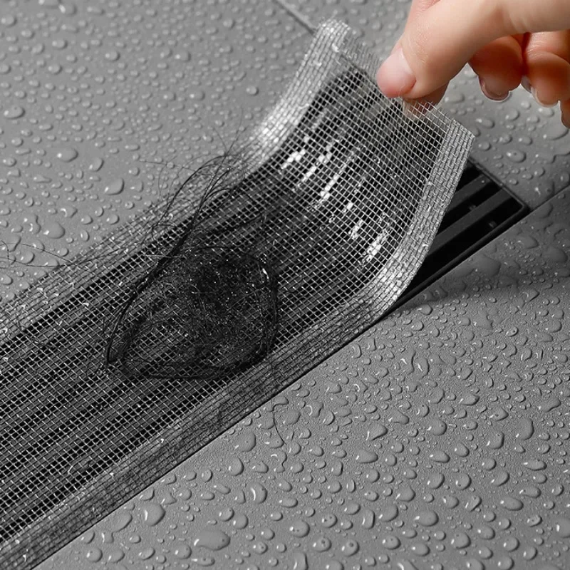 Одноразовые наклейки-фильтры для слива в полу