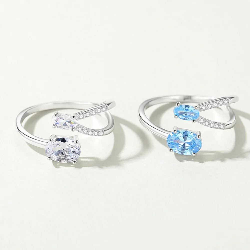 Кольцо женское из серебра 925 пробы с синим геометрическим крестом