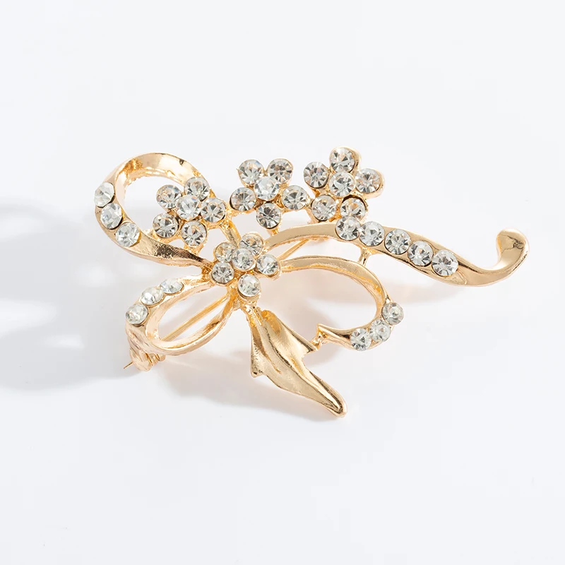 Женская брошь в виде цветка с бантом