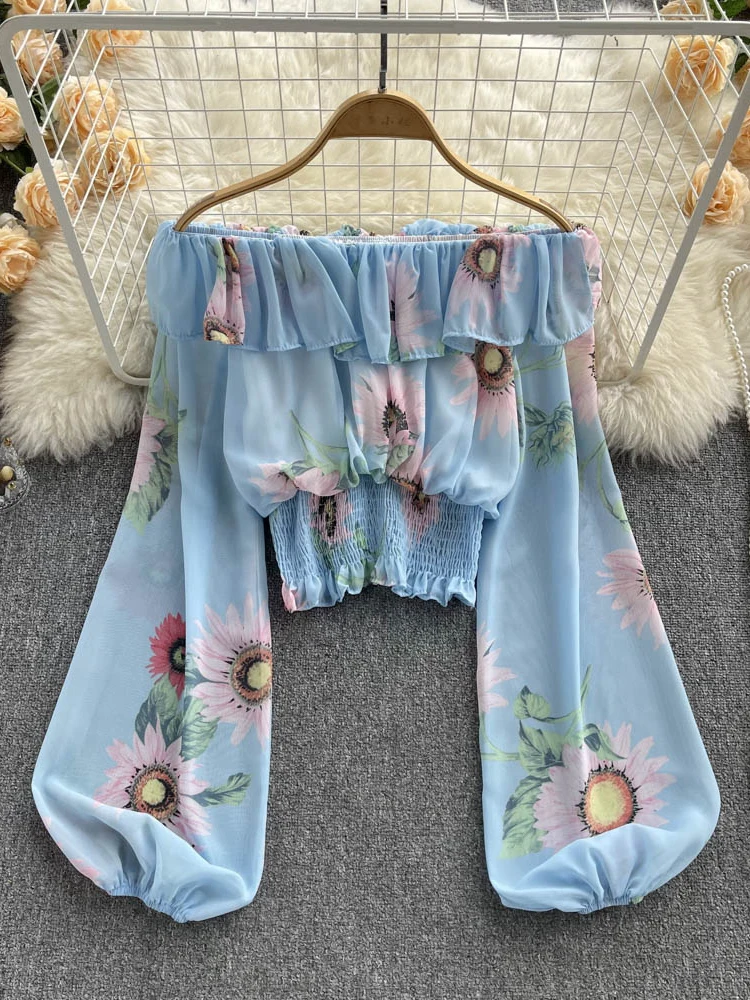 

Женская блузка в этническом стиле с рукавами-фонариками и цветочным принтом