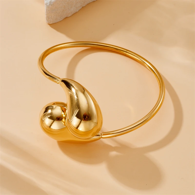 Браслет MEYRROYU открывающийся из нержавеющей стали 316L золотого цвета в форме капли