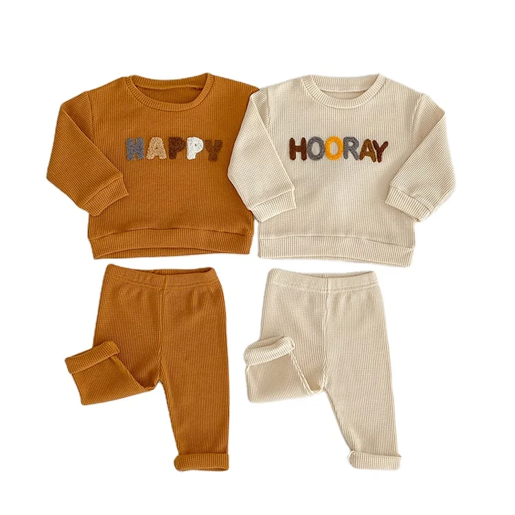 

Детский хлопковый комплект из пуловера с длинным рукавом и штанов