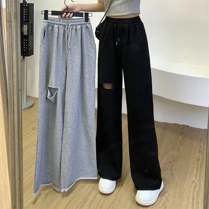 

Брюки женские рваные с широкими штанинами, повседневные однотонные прямые модные спортивные штаны с завышенной талией, в Корейском стиле