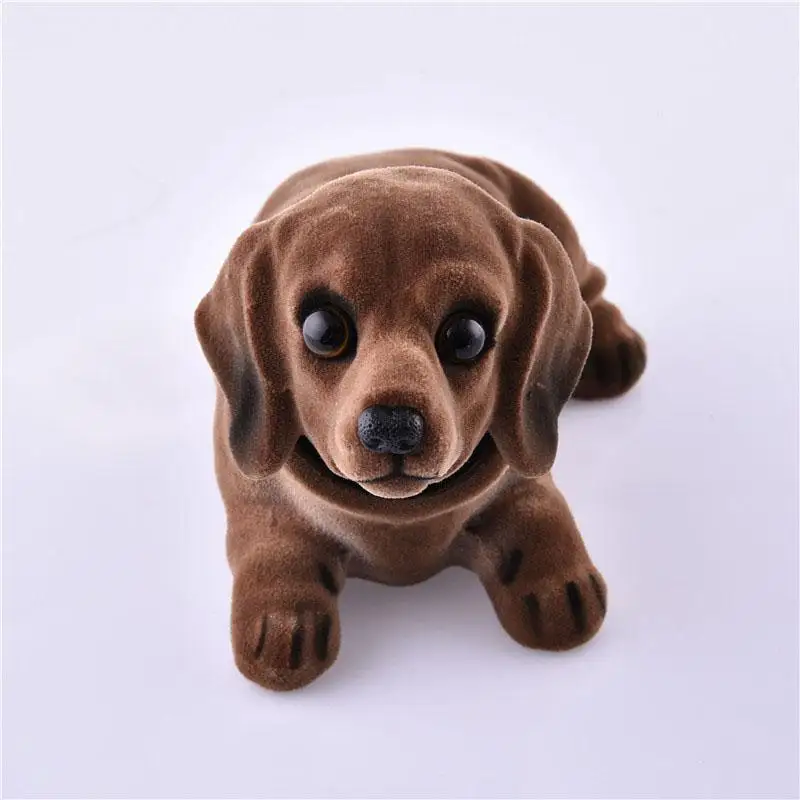 Собачка с качающейся головой для автомобиля. Автомобильная собачка с качающейся головой. Собачка с качающейся головой для автомобиля. Собачка на торпеду. Собачка в машину.