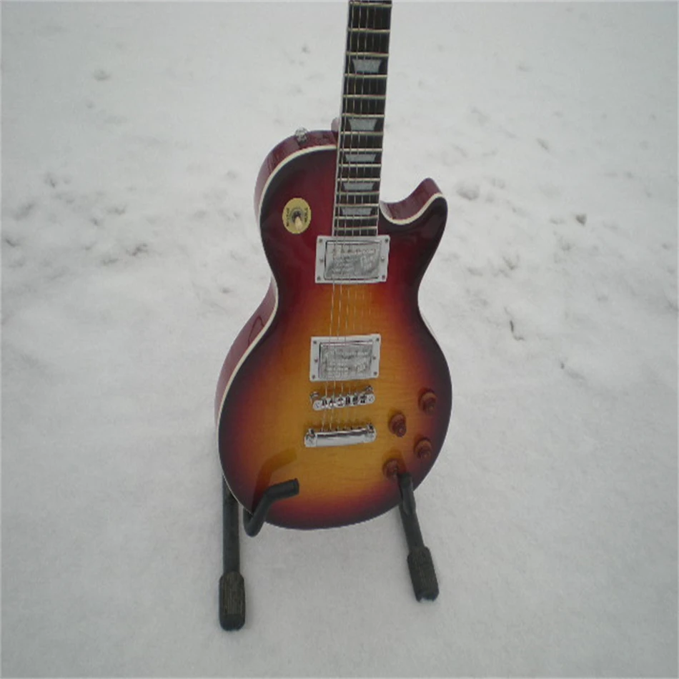 

Free shipping, high quality electric guitars. Flame tiger print, red color, silver hardware