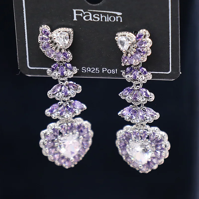 

Jewelry fashion new earrings European and American hand-inlaid zircon delicate and lovely peach heart tassel earrings