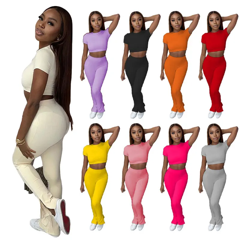 Женский спортивный костюм из двух предметов короткий топ и расклешенные брюки |