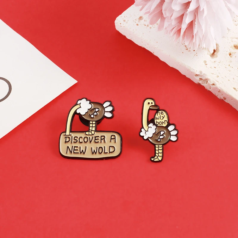 

Cartoon Animal Series Brooches Brown Ostrich DISCOVER A NEW WOLD Lapel Enamel Pin Badges Corsage Xmas Jewelry Gift Wholesale