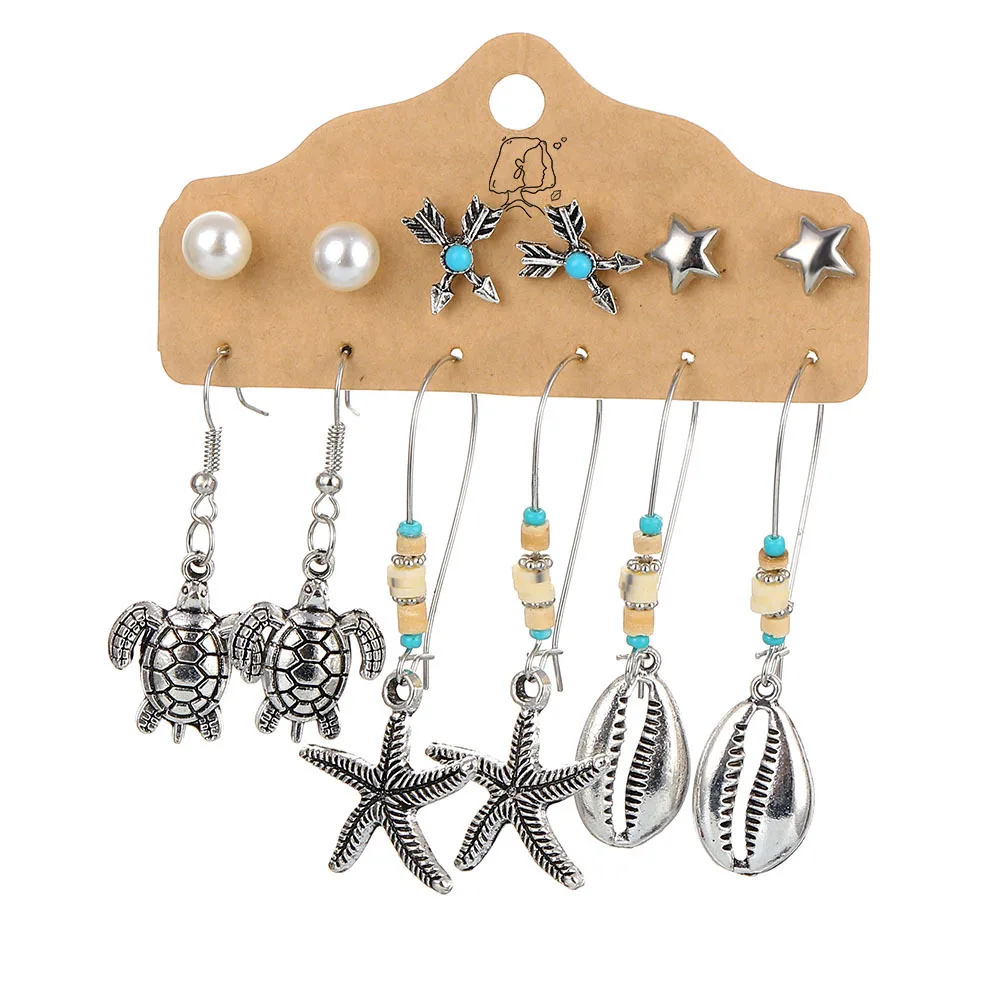 серьги женские кольца набор сережекКомплект женских сережек-гвоздиков в стиле