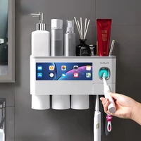 terup magnetic adsorption inverted toothbrush holder automatic toothpaste squeezer dispenser storage rack bathroom accessories