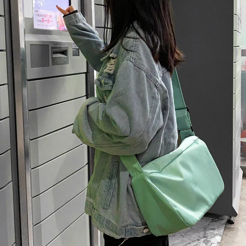 

Korean Version of Large Capacity Japanese Functional Canvas Bag for Women's Versatile Student Crossbody Bag for Men and Women