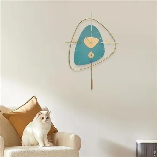 

2023 New Modern Wrought Iron Creative Fashion Swing Wall Clock Living Room Wall Mute Clock Home Hanging Wall Restaurant