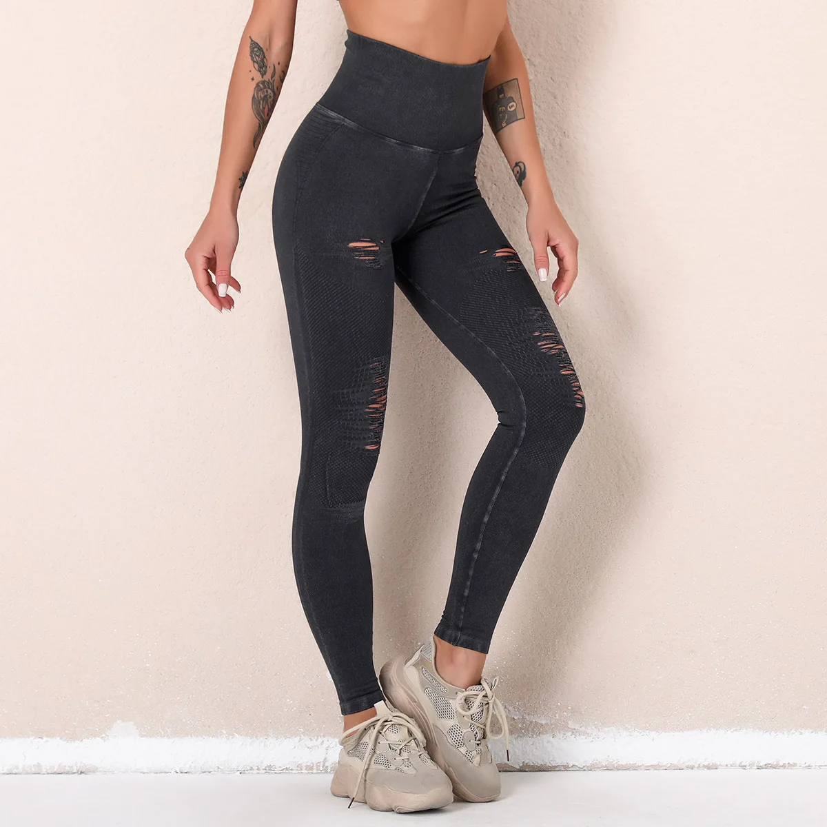 

Europe and the United States cross-border new water wash yoga pants broke hole hollow seamless high waist sports nine pants hip