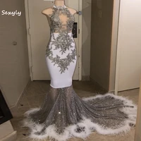 sparkly sequin mermaid evening dress 2022 white halter see through neck black girls prom dresses with feather lace beaded party