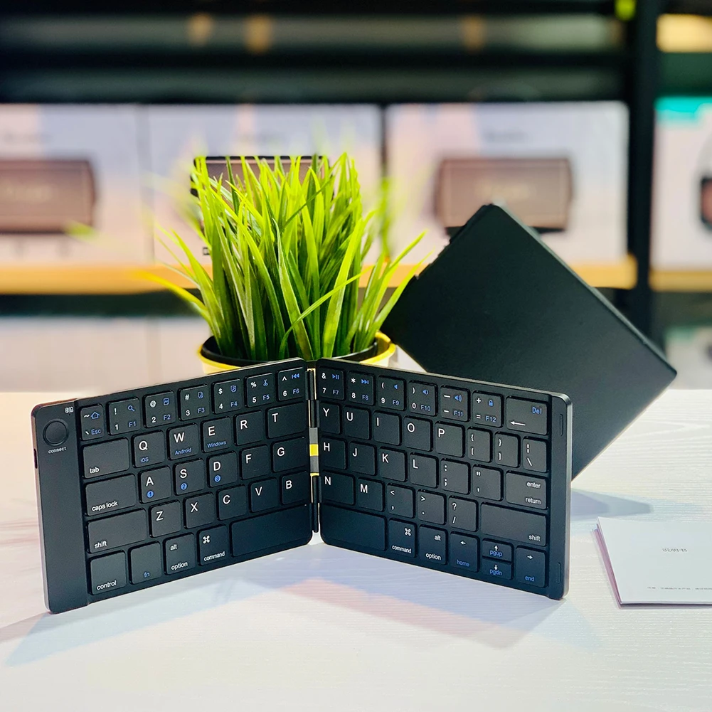 

Keyboard Multi-Function Foldable Keyboard 65 Keys Keypad Rechargeable for Android Windows for Tablet Phone